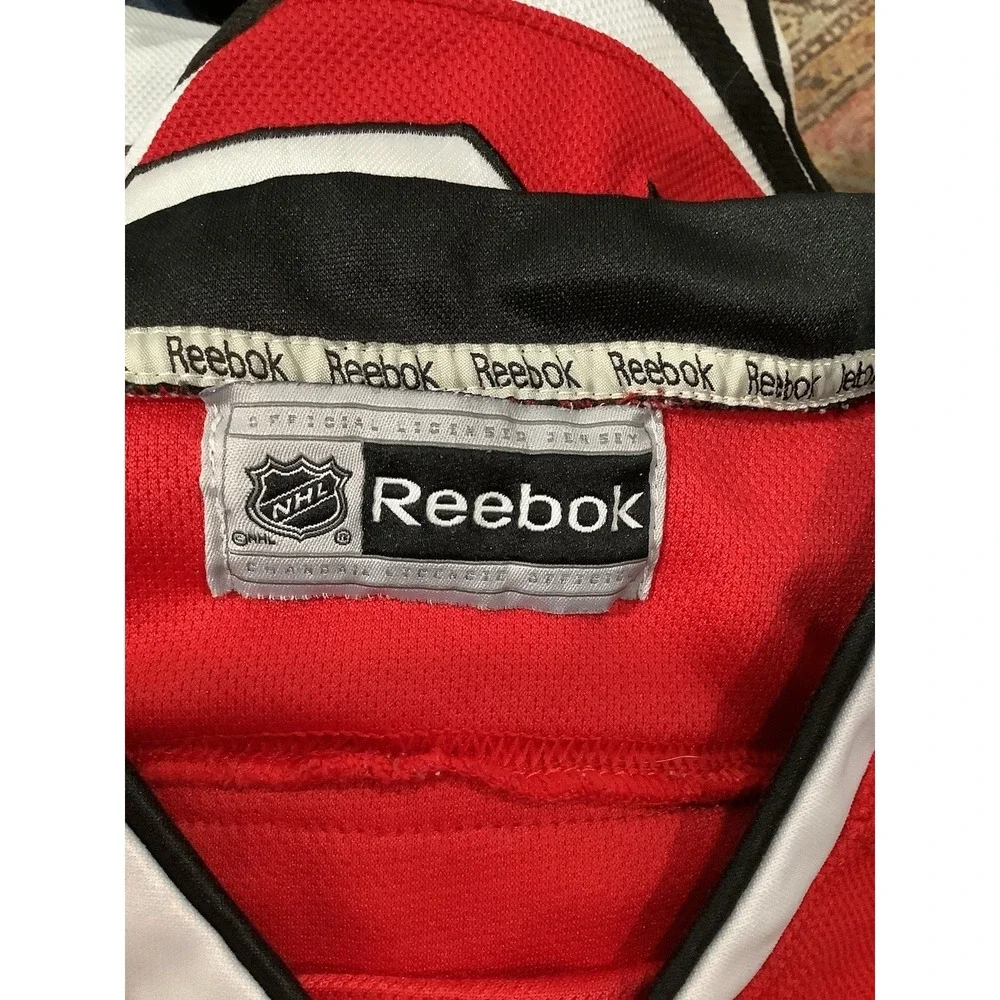 Reebok Chicago Blackhawks Jersey NHL Hockey Youth Size S/M Jonathan Toews #19 C